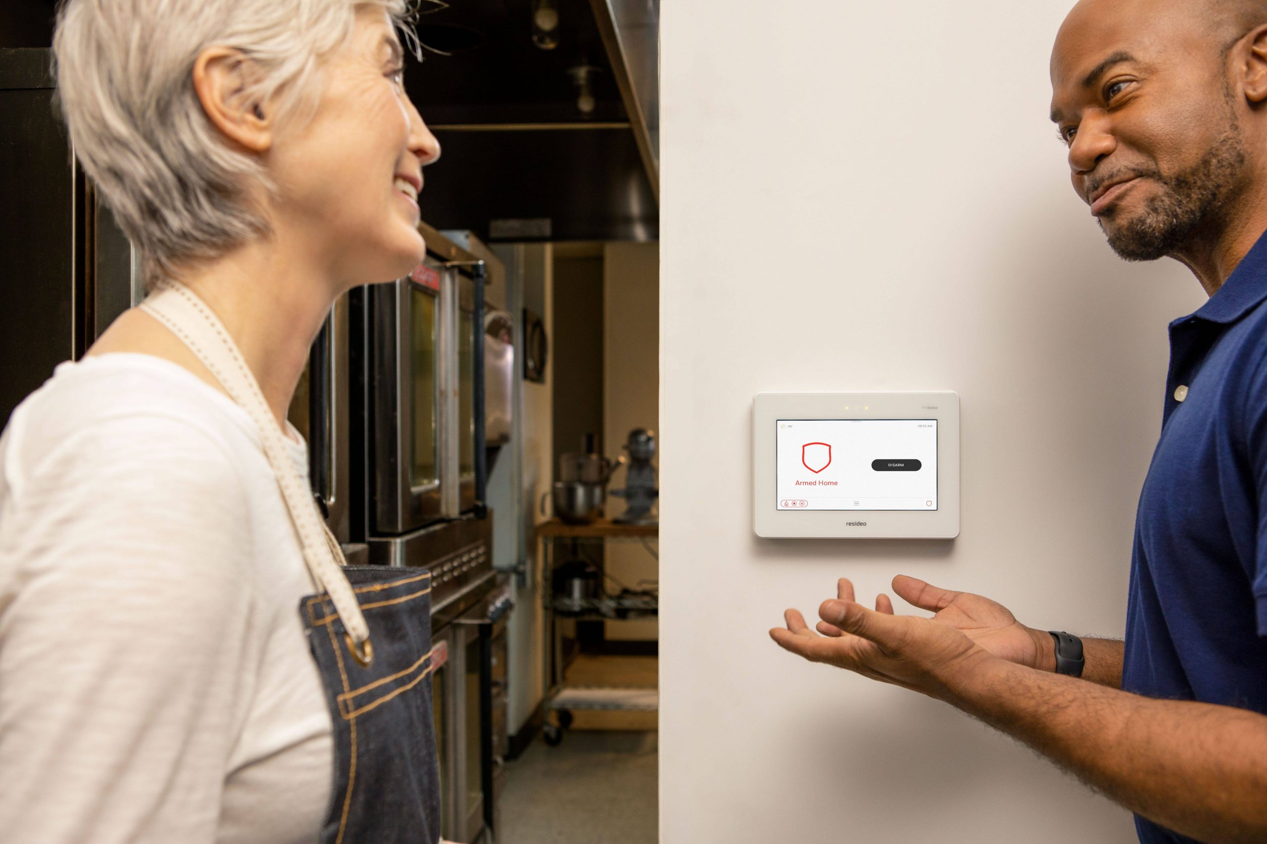 A bakery owner is happy with the business security systems installation from A-Bell Alarms
