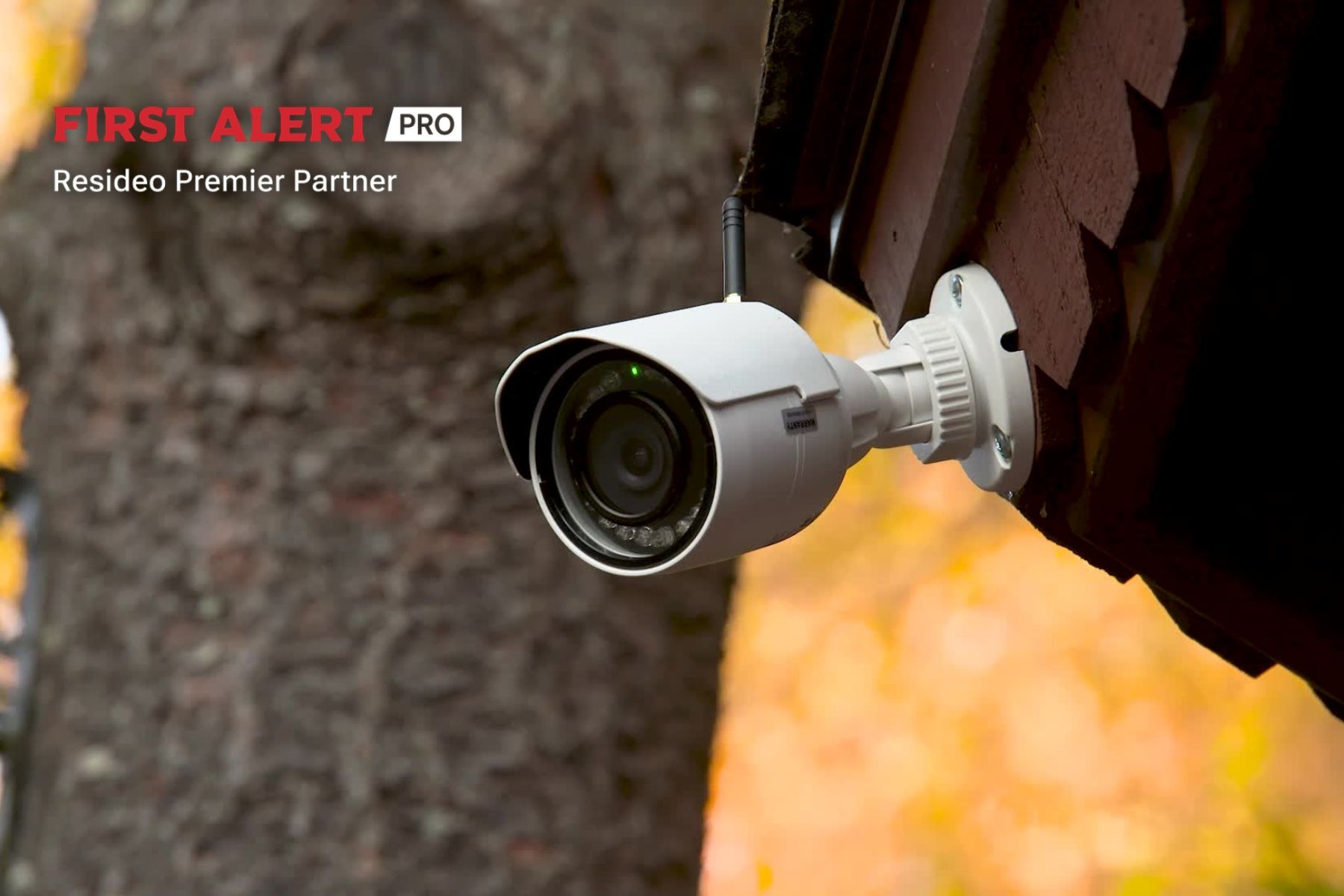 An outdoor security camera mounted to a home.